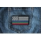 Blue Green and Red Striped American Flag Patch Blue Green and Red Striped American Flag Patch shown on jeans