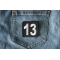 13 Patch Black and White Square 13 Patch shown on jeans