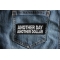 Another Day Another Dollar Patch Another Day Another Dollar Patch shown on jeans