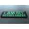 I am My Sister's Keep Patch Green I am My Sister's Keep Patch Green diagonal view