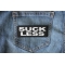Suck Less Patch Suck Less Funny Iron on Patch shown on jeans
