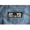 Ay Yo What the Fuck Patch shown on jeans