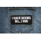 I have Boobs So I Win Iron on Patch shown on jeans
