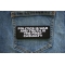Politics is War and Truth is the First Casualty Patch shown on jeans