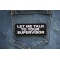 Let me Talk to your Supervisor Patch shown on jeans