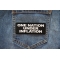 One Nation Under Inflation Patch shown on jeans