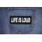 Life is Loud Patch shown on jeans