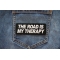 The Road is my Therapy Patch shown on jeans