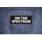 On The Spectrum Patch shown on jeans