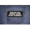 Dream Big Work Hard Stay Humble Patch shown on jeans