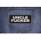 Uncle Fucker Patch shown on jeans