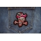 Crazy Skull and Bone Patch shown on jeans