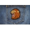 Screaming Lion Iron on Patch shown on jeans