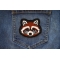 Raccoon Iron on Patch shown on jeans