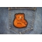 Funny Bear Iron on Patch shown on jeans