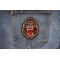 Ugly Monkey Iron on Patch shown on jeans