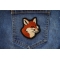 Smiling Fox Patch shown on jeans