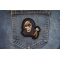 Laughing Reaper Patch shown on jeans