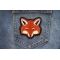 Fox Patch shown on jeans