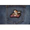 Skelo Motorcycle Rider Patch shown on jeans