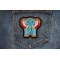 Blue Elephant Patch shown on jeans