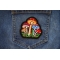 Magic Mushrooms Patch shown on jeans