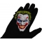 Cheeky Joker Patch shown on hand for size comparison
