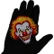 Afro Clown Patch shown on hand for size comparison