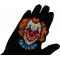Scary Clown Patch shown on hand for size comparison