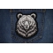 Bear Stare Patch shown on jeans