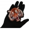 Handsome Tiger Patch shown on hand for size comparison
