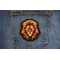 Lion with a Stare Patch shown on jeans