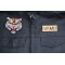 Tiger Snaring Patch shown on leather vest