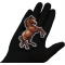 Horse Patch shown on hand for size comparison