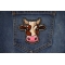 Cartoon Cow Patch shown on jeans
