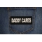 Daddy Cares Patch shown on jeans