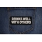 Drinks Well with Others Patch shown on jeans