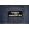 Warning I void warranties Patch shown on jeans