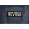 Don't Grow Up It's a Trap Patch Don't Grow Up It's a Trap Patch shown on jeans