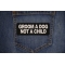 Groom a Dog Not a Child Patch shown on jeans