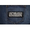 I Stand with the innocent Not with a war hungry Governments Patch shown on jeans