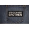 World's Okayest Brother Patch shown on jeans