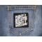 Drill Baby Drill Patch shown on jeans