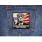 Divine Intervention Trump Patch shown on jeans