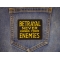 Betrayal Never Comes From Enemies Patch shown on jeans