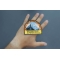 Everest Patch shown on hand for size comparison