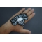 Death Metal Skull Patch shown on hand for size comparison