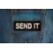 Send It Patch shown on jeans