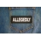 Allegedly Patch Allegedly Patch shown on jeans