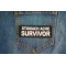 Stomach Ache Survivor Patch shown on jeans